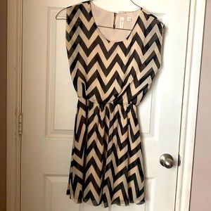 Taupe/Nude and black printed dress.